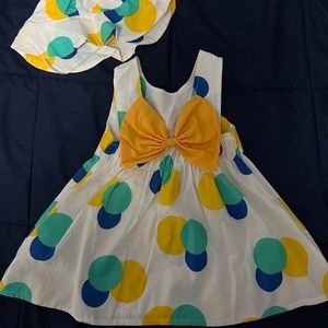 Colorful dress with matching hat for baby girl